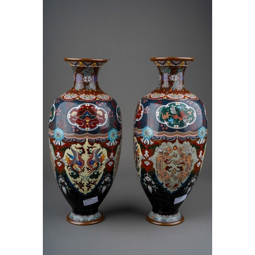 365 - A pair of early 20th century cloisonne ovoid vases, decorated with panels of dragons, exotic birds a... 