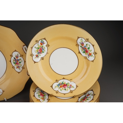 366 - A Crown Chelsea China tea set, apricot ground with printed and painted panels of flowers, comprising... 