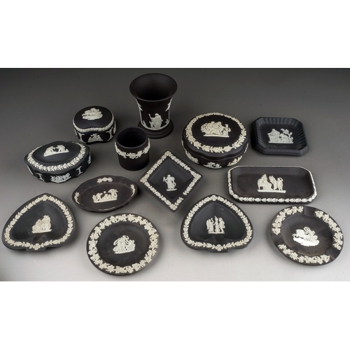 367 - A collection of thirteen pieces of 20th century black basalt Wedgwood, including three trinket boxes... 