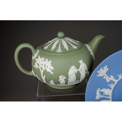 369 - A collection of Wedgwood jasperware in terracotta, lilac, green, yellow, pale blue, dark blue and wh... 