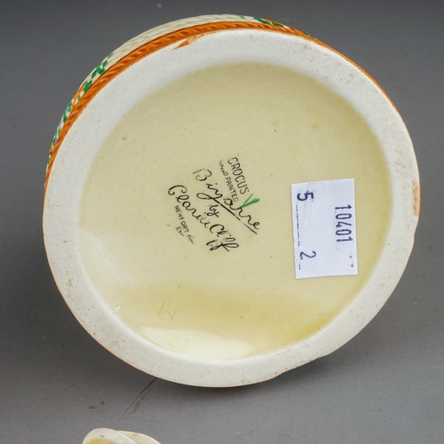 372 - Two items of Clarice Cliff Bizarre Crocus pattern for Newport Pottery, comprising a honey pot and co... 