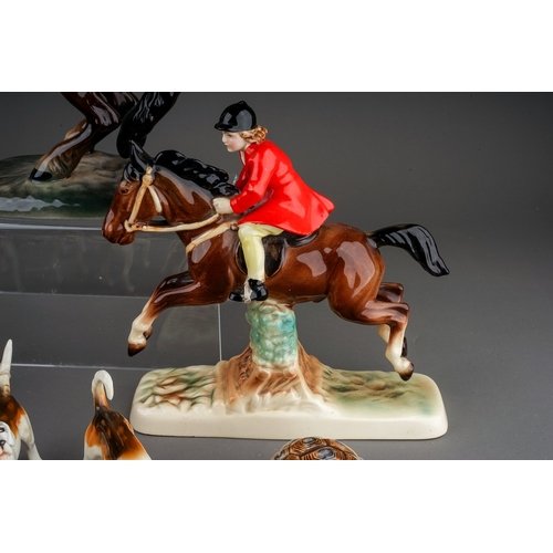 376 - A group of Beswick, Wade and other animal ceramics, including a Beswick Welsh Cob (rearing), model n... 