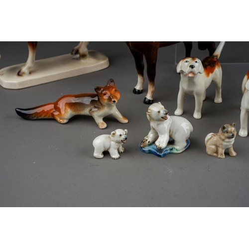 376 - A group of Beswick, Wade and other animal ceramics, including a Beswick Welsh Cob (rearing), model n... 