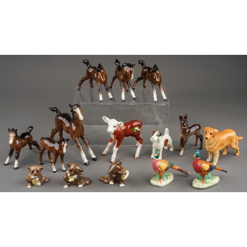 378 - A collection of thirteen small Beswick animals, including Hereford calf 901b, Bush Baby with mirror ... 