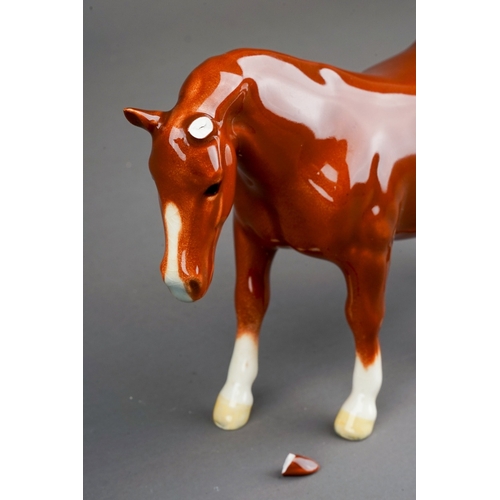 382 - A rare Beswick Boys Pony in chestnut gloss, model no.1480, height in 9.5cm, one ear broken but loose... 