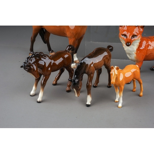 383 - Seven assorted Beswick animals, comprising a Hippo, gloss, model no.1532, Tigress, gloss model no. 1... 