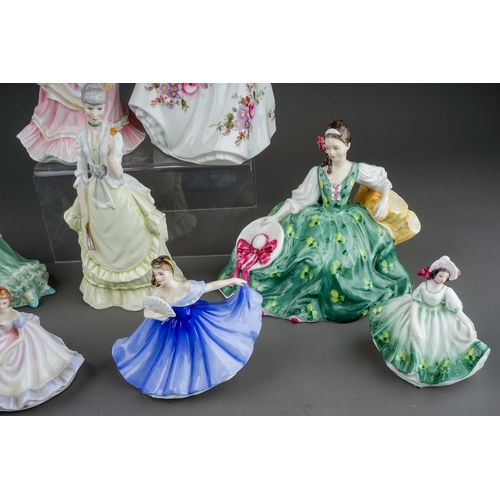 388 - Eight Royal Doulton lady figures and a Royal Worcester figure Fragrance, the Royal Doulton comprises... 