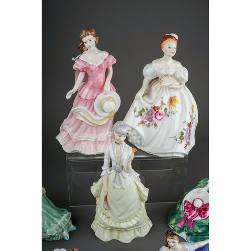 388 - Eight Royal Doulton lady figures and a Royal Worcester figure Fragrance, the Royal Doulton comprises... 