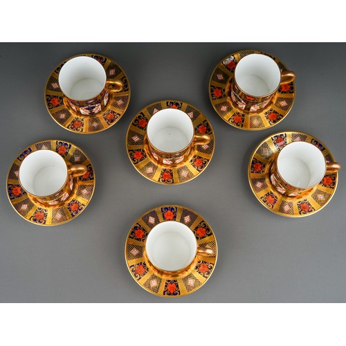 390 - A set of six Royal Crown Derby Imari 1128 solid gold band coffee cans and saucers, five bear date co... 