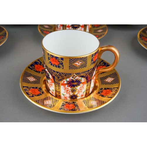 390 - A set of six Royal Crown Derby Imari 1128 solid gold band coffee cans and saucers, five bear date co... 