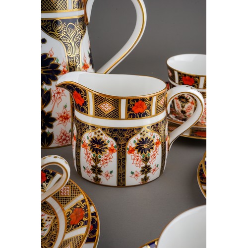 393 - A Royal Crown Derby Imari 1128 pattern twenty two piece tea set, comprising hot water jug and cover,... 