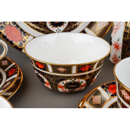 393 - A Royal Crown Derby Imari 1128 pattern twenty two piece tea set, comprising hot water jug and cover,... 