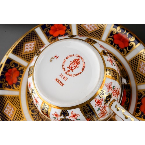 393 - A Royal Crown Derby Imari 1128 pattern twenty two piece tea set, comprising hot water jug and cover,... 