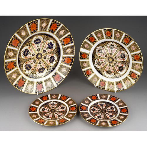 394 - Four Royal Crown Derby Imari 1128 pattern plates, comprising two tea plates, a 23cm plate (second) a... 