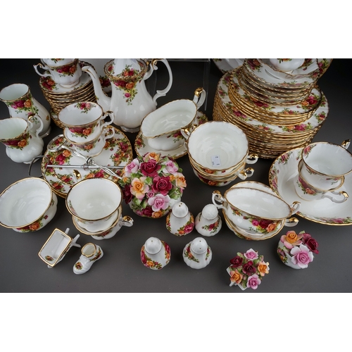 406 - A large collection of Royal Albert 