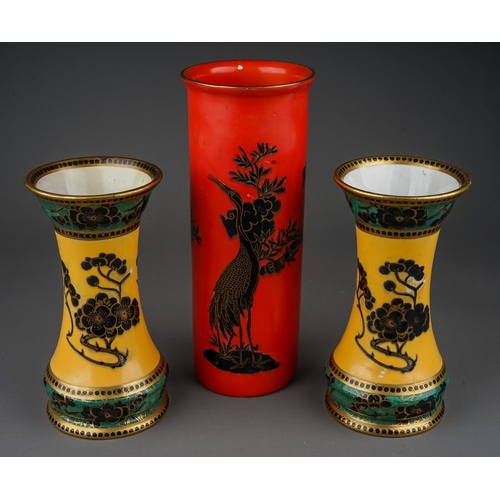 414 - A pair of Maling waisted vases, pattern no 5611, circa 1932-34, the yellow ground decorated with bla... 