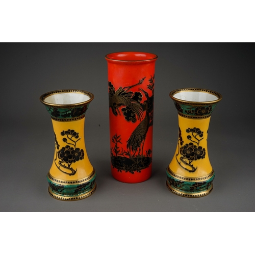 414 - A pair of Maling waisted vases, pattern no 5611, circa 1932-34, the yellow ground decorated with bla... 