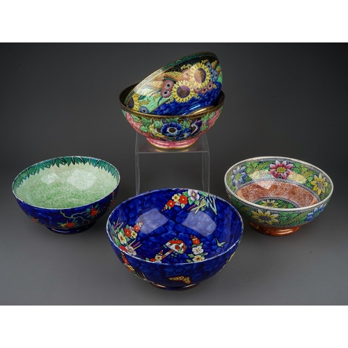 426 - A group of five Maling lustre ware bowls to include: 
1. Bouquet with sunflowers, pattern no 6325, c... 