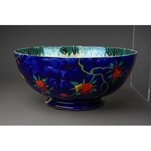 426 - A group of five Maling lustre ware bowls to include: 
1. Bouquet with sunflowers, pattern no 6325, c... 