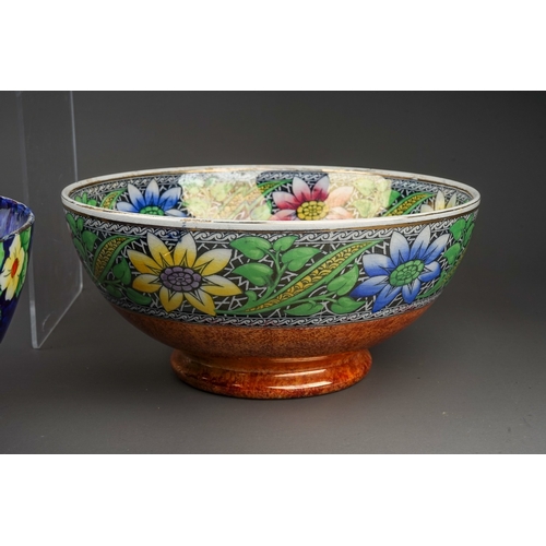 426 - A group of five Maling lustre ware bowls to include: 
1. Bouquet with sunflowers, pattern no 6325, c... 