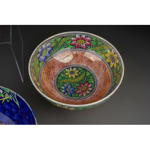 426 - A group of five Maling lustre ware bowls to include: 
1. Bouquet with sunflowers, pattern no 6325, c... 