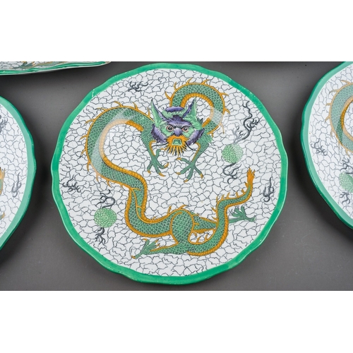 430 - A Copeland Late Spode ten piece dessert service printed and tinted with a green dragon on a crackle ... 