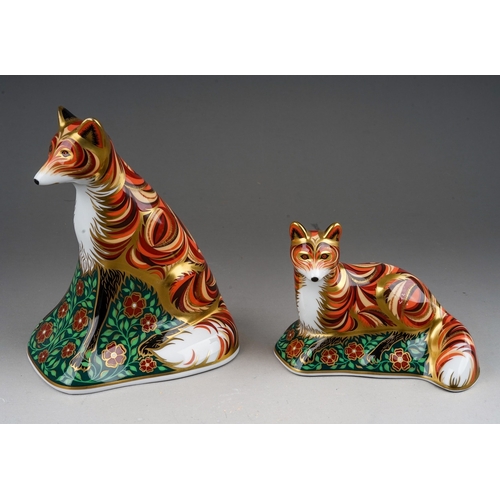 449 - Two Royal Crown Derby paperweights, comprising Vixen and Fox Cub, both with gold stoppers, first qua... 