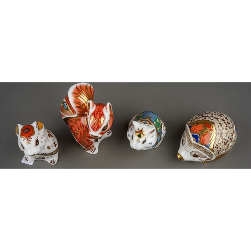 457 - Four Royal Crown Derby paperweights, comprising Hawthorn hedgehog, Woodland Squirrel, Mouse, Hamster... 