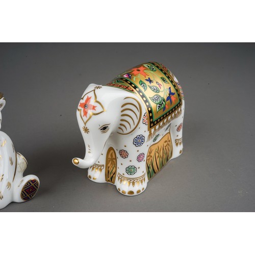 459 - Three Royal crown Derby paperweights, comprising infant Indian Elephant, Donkey Foal and Graduate (t... 