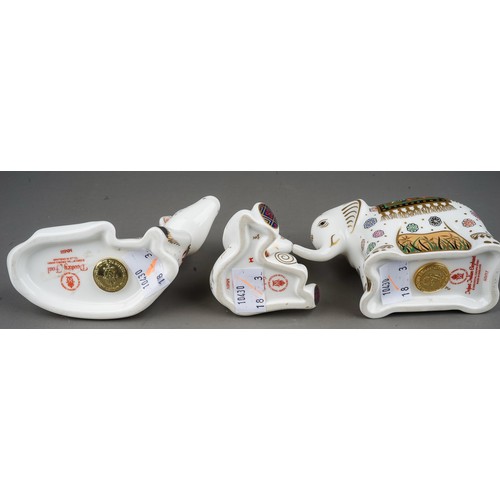 459 - Three Royal crown Derby paperweights, comprising infant Indian Elephant, Donkey Foal and Graduate (t... 