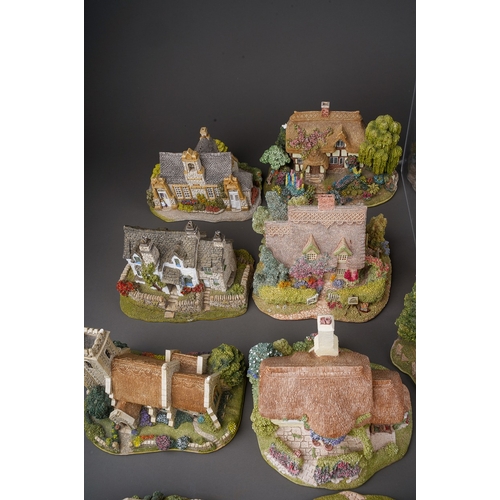 470 - Large collection of Lilliput lane houses to include Saxon cottage, Lakeland Christmas collection, ap... 