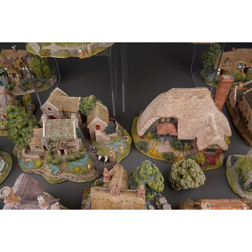 470 - Large collection of Lilliput lane houses to include Saxon cottage, Lakeland Christmas collection, ap... 