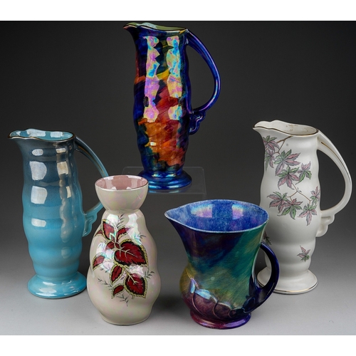 473 - A group of Maling lustre ware to include: four pitcher jugs including pattern no 6590, 5259 and a Co... 