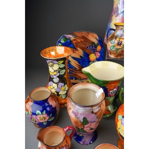 478 - A large collection of Hollingshead & Kirkham (H&K Tunstall) circa 1930s vases, plates and jugs, the ... 