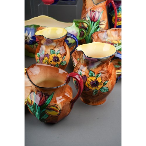 478 - A large collection of Hollingshead & Kirkham (H&K Tunstall) circa 1930s vases, plates and jugs, the ... 