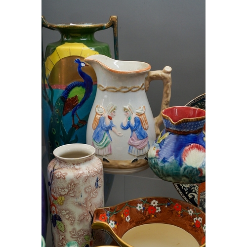 482 - A large collection of early 20th Century pottery to include vases, bowls, plates, jugs etc including... 