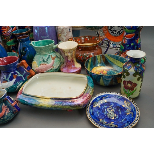 482 - A large collection of early 20th Century pottery to include vases, bowls, plates, jugs etc including... 