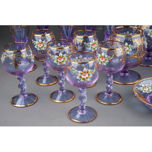 506 - A twenty-three piece Murano Cenesese Vetri liqueur set of purple glass, transfer printed, enamelled ... 