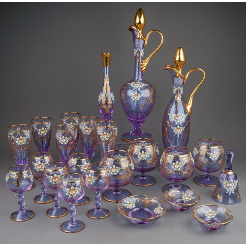 506 - A twenty-three piece Murano Cenesese Vetri liqueur set of purple glass, transfer printed, enamelled ... 