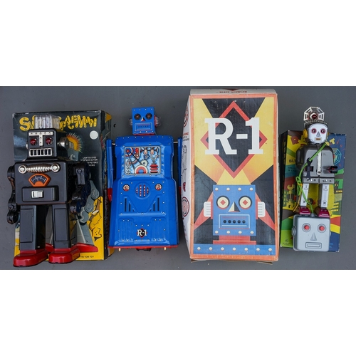 534 - Three modern boxed battery operated robots Tin Tom Toys