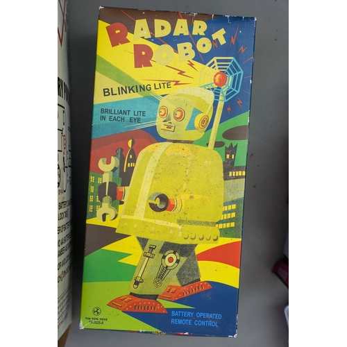 534 - Three modern boxed battery operated robots Tin Tom Toys