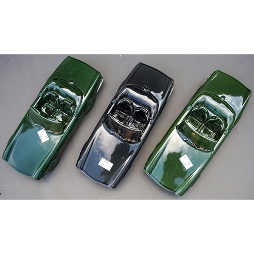 543 - Three Triumph TR6 ceramic sports car models