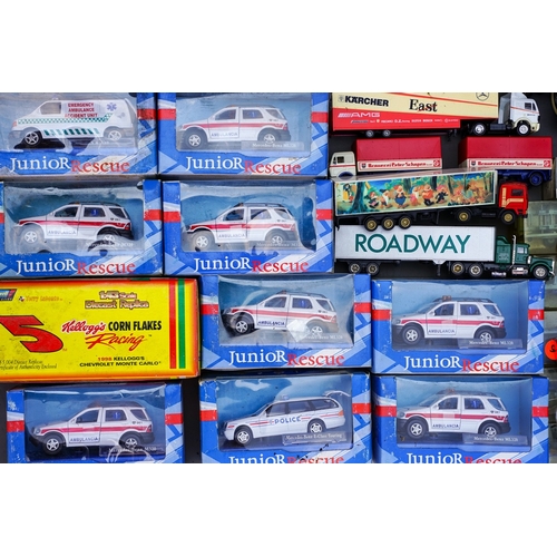 545 - A quantity of Corona Junior Rescue boxed vehicles, and various diecast vehicles.  2 trays