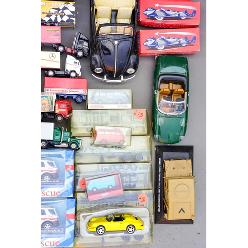 545 - A quantity of Corona Junior Rescue boxed vehicles, and various diecast vehicles.  2 trays