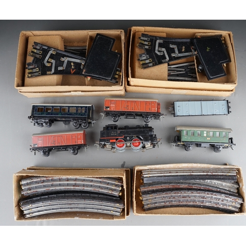 554 - Trix Express HO/00 German issue tank loco, wagons and track.  All in boxes