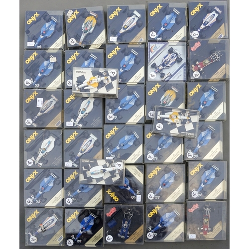 558 - One tray of 30 plus Onyx, F1 racing cars, boxed