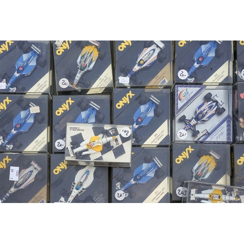 558 - One tray of 30 plus Onyx, F1 racing cars, boxed