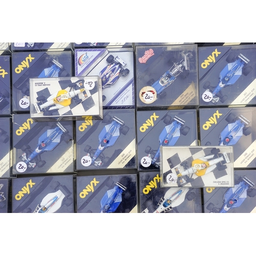 559 - One tray of 30 plus Onyx, F1 racing cars, boxed