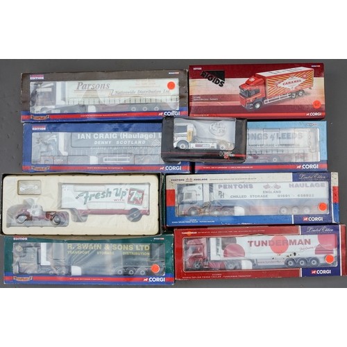 569 - A group of boxed trucks and trailers, corgi heavy haulers, etc