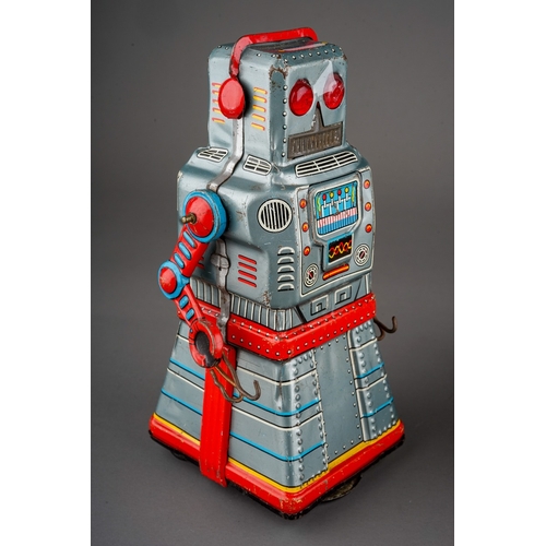 574 - A 1960's KO Yoshiya Japanese tin plate Action Atom robot, friction driven, height 16cm, together wit... 